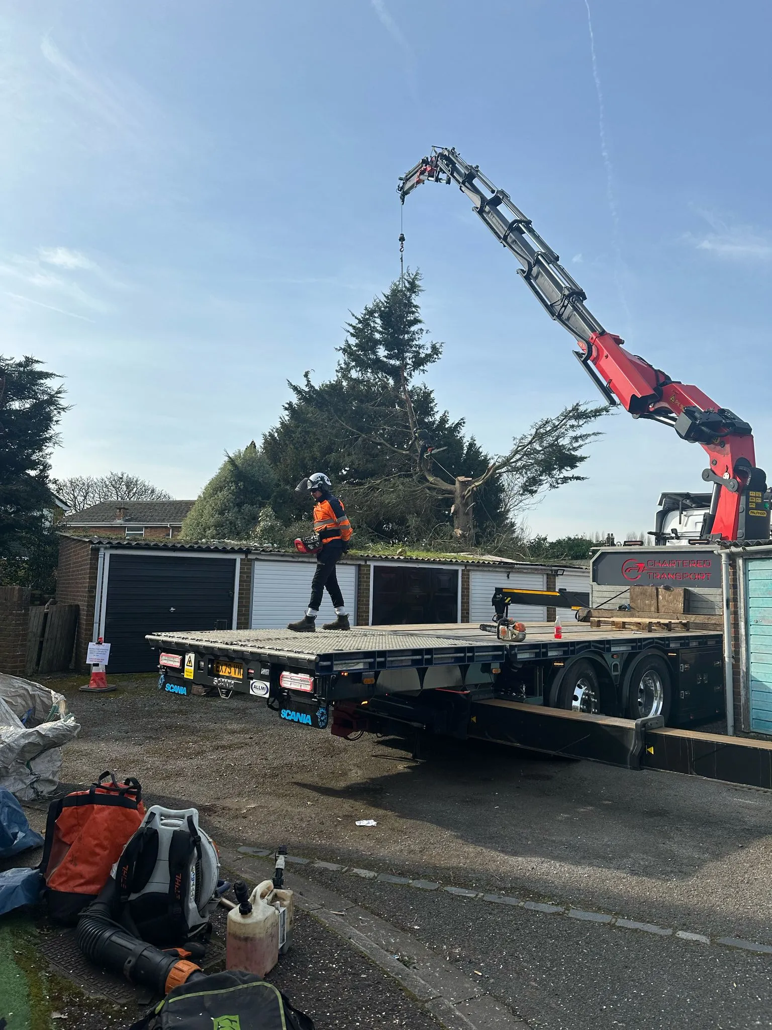 Large Crane with orange man